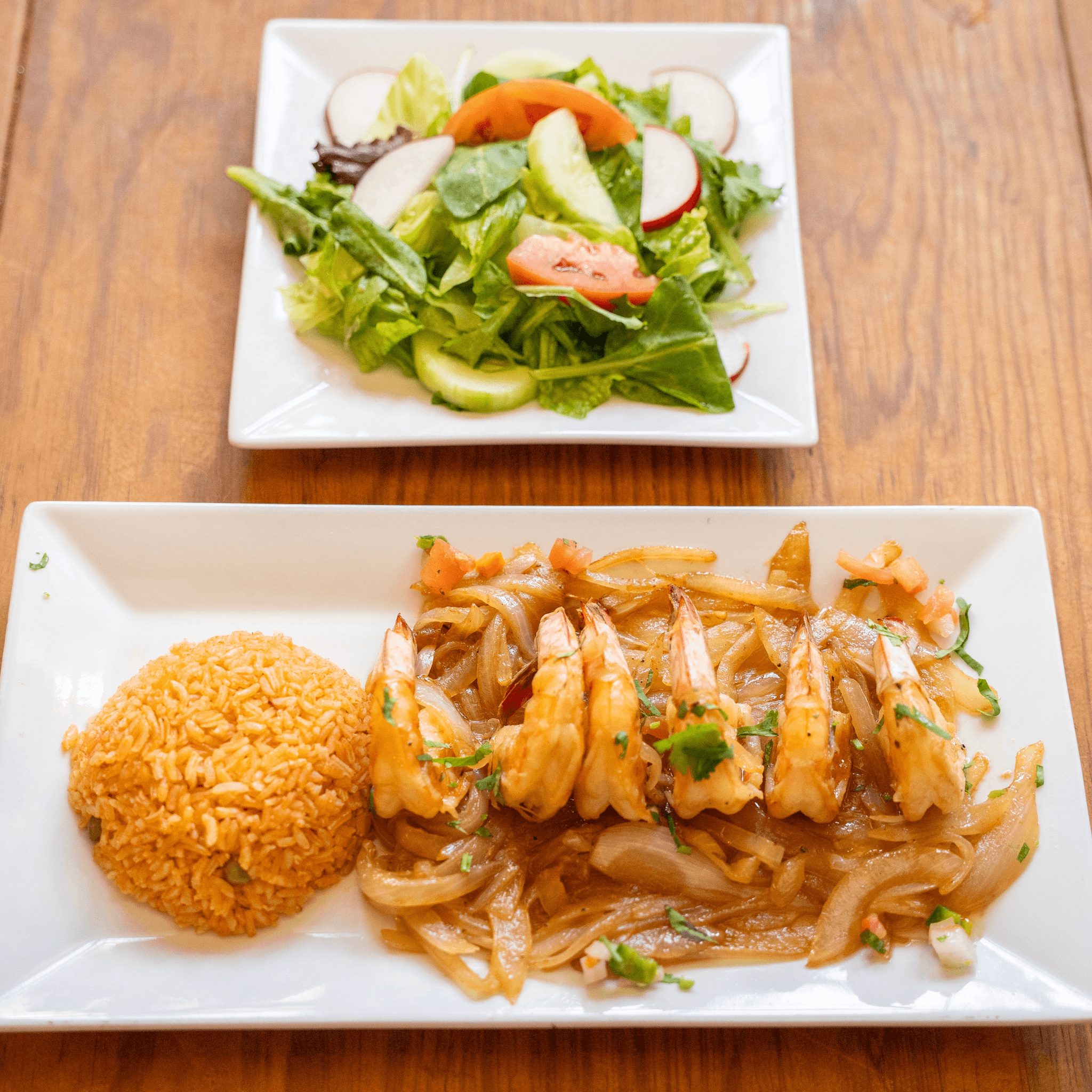 Camarones Encebollados.