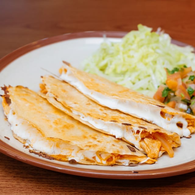 Tinga De Pollo Quesadillas.