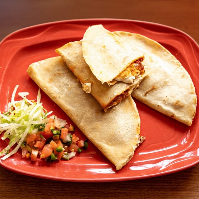 Chicharron Prensado Quesadillas.