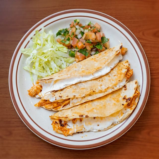 Tinga De Pollo Tacos.